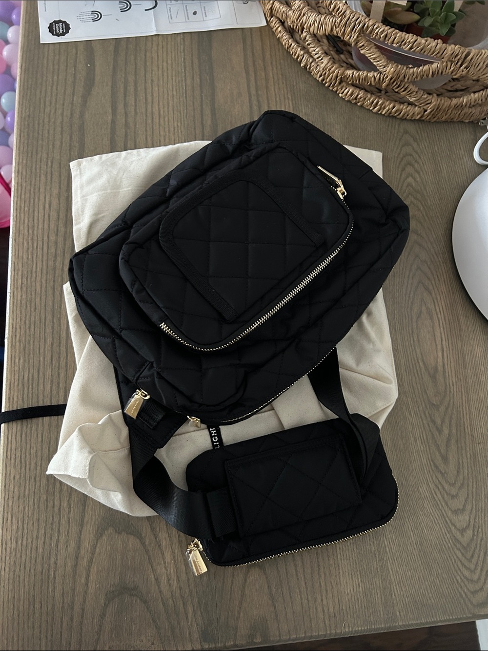 Black Quilted Crossbody Sling Bag with Gold Accents